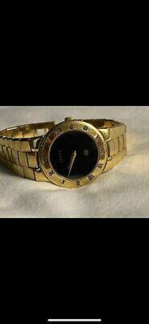 Woman’s gold ( Black Face ) Gucci watch