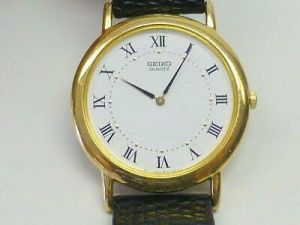 Seiko Men's Dress Watch Wristwatch Black Leather Gold Tone Case Roman Numerals
