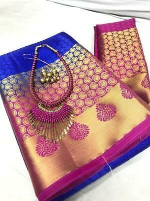 Tussar silk heavu border saree with heavy rich contrast pallu with silk jewllery